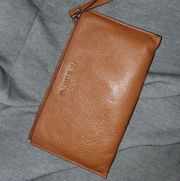 Michael Kors Handbags - MICHAEL KORS WRISTLET gold hardware.